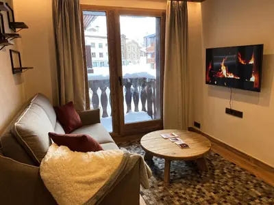 Télévision ou salle de divertissement dans l'établissement les jardins de val