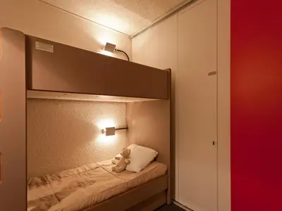 Un ou plusieurs lits dans un hébergement de l'établissement Studio confortable skis aux pieds avec balcon - FR-1-346-350