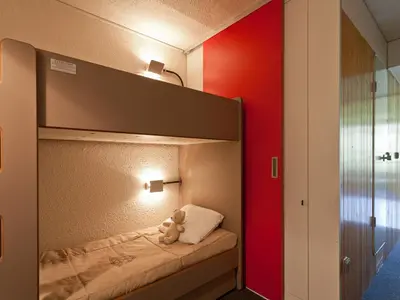 Un ou plusieurs lits dans un hébergement de l'établissement Studio confortable ski aux pieds, balcon sud, 5 pers. - FR-1-346-371