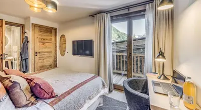 Un ou plusieurs lits dans un hébergement de l'établissement Résidence Casa San Bernardo - Chalet 5 