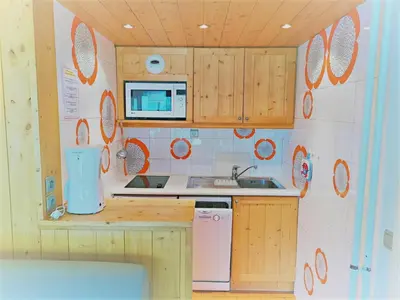 Cuisine ou kitchenette dans l'établissement Résidence Le Palafour - Joli et grand studio 4 personnes à Tignes au pied des pistes, des commerces, de l'ESF et de l'office du tourisme dans le quarti MAE-2103
