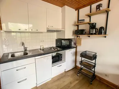 Cuisine ou kitchenette dans l'établissement Résidence Hauts Lieux - Grand studio cabine au centre de Tignes Le Lac MAE-7414