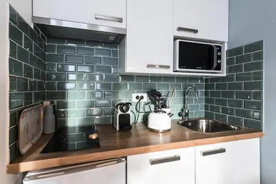 Cuisine ou kitchenette dans l'établissement Résidence Home Club - Studio rénové · Proche des pistes et des commerces MAE-7424