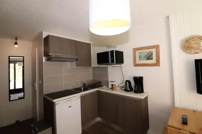 Cuisine ou kitchenette dans l'établissement Résidence Olympiques - Studio à Tignes 1800 MAE-7484