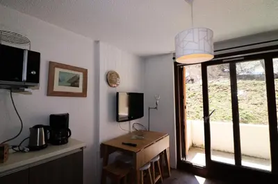 Télévision ou salle de divertissement dans l'établissement Résidence Olympiques - Studio à Tignes 1800 MAE-7484