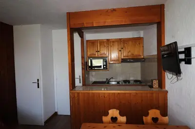 Cuisine ou kitchenette dans l'établissement Résidence Home Club - Studio avec vue sur le lac du Chevril MAE-7504