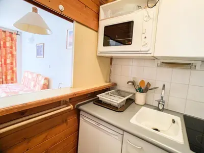 Cuisine ou kitchenette dans l'établissement Résidence Hameau Du Borsat 3 - Studio cabine au pied des remontées mécaniques MAE-7534