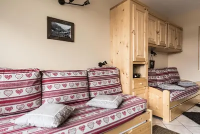 Coin salon dans l'établissement Résidence Bec Rouge - Appartement lumineux·Accès direct pistes·Balcon MAE-7594