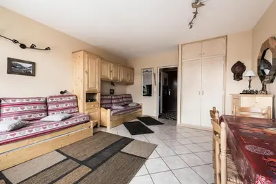 Coin salon dans l'établissement Résidence Bec Rouge - Appartement lumineux·Accès direct pistes·Balcon MAE-7594