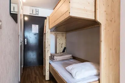 Un ou plusieurs lits dans un hébergement de l'établissement Résidence Prariond A - Studio pour 4 personnes au Val Claret MAE-7674