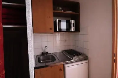 Cuisine ou kitchenette dans l'établissement Résidence Rond Point Des Pistes B - Studio·Proche des pistes·Balcon MAE-7734