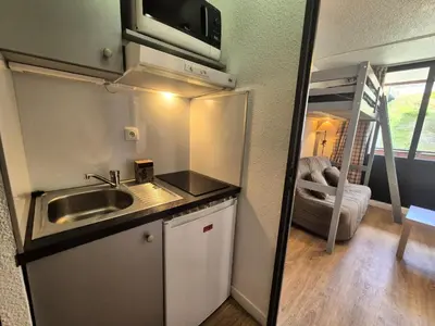 Cuisine ou kitchenette dans l'établissement Résidence Rond Point Des Pistes A - Appartement rond point des pistes Val Claret MAE-7744