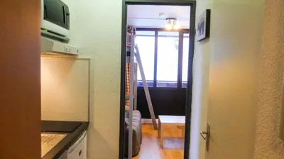 Cuisine ou kitchenette dans l'établissement Résidence Rond Point Des Pistes A - Appartement rond point des pistes Val Claret MAE-7744