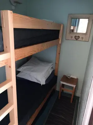 Un ou plusieurs lits dans un hébergement de l'établissement Nouvelles Residences - Studio équipé pour 4 personnes MAE-7774