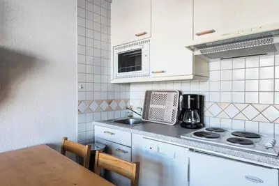 Cuisine ou kitchenette dans l'établissement Résidence Curling B3 - Studio au Curling B3 MAE-7784