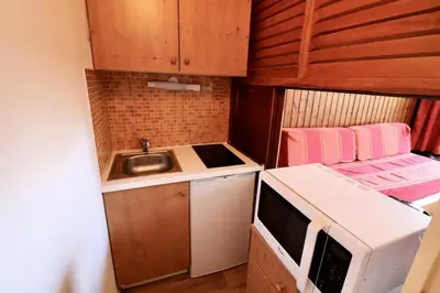 Cuisine ou kitchenette dans l'établissement Résidence Platieres - Studio fonctionnel et lumineux MAE-7794