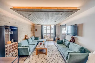 Coin salon dans l'établissement Résidence Les Rives - Appartement rénové - 82m2 - 8 personnes MAE-7304