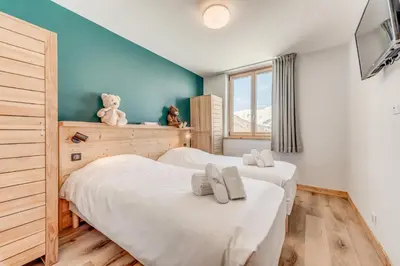 Un ou plusieurs lits dans un hébergement de l'établissement Résidence Les Rives - Appartement rénové - 82m2 - 8 personnes MAE-7304