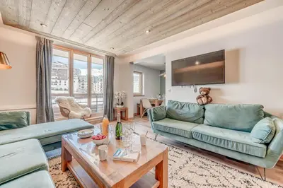 Coin salon dans l'établissement Résidence Les Rives - Appartement rénové - 82m2 - 8 personnes MAE-7304