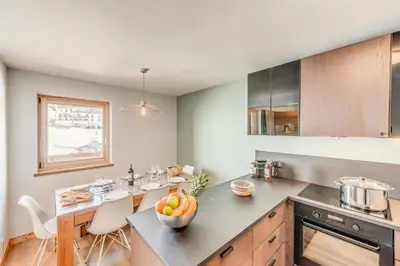 Cuisine ou kitchenette dans l'établissement Résidence Les Rives - Appartement rénové - 82m2 - 8 personnes MAE-7304