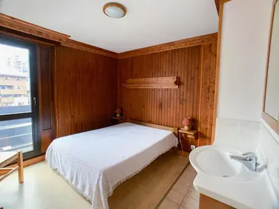 Un ou plusieurs lits dans un hébergement de l'établissement Appartement Confortable pour 9 pers. avec Balcon à Tignes Val Claret - FR-1-502-387