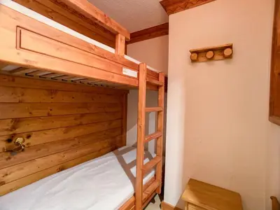 Un ou plusieurs lits dans un hébergement de l'établissement Appartement Confortable pour 9 pers. avec Balcon à Tignes Val Claret - FR-1-502-387