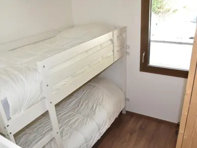 Un ou plusieurs lits dans un hébergement de l'établissement Bel appartement avec grande terrasse et WiFi à Pralognan - FR-1-464-208