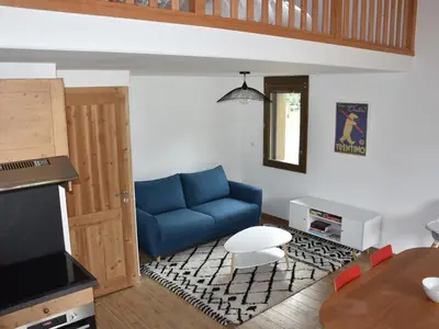 Coin salon dans l'établissement Appartement Neuf avec Balcon à 400m des Remontées Mécaniques - Capacité 5 Personnes - FR-1-464-209