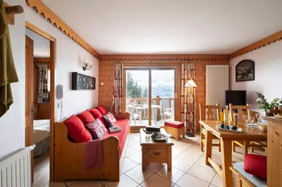 Coin salon dans l'établissement Résidence Pierre & Vacances Premium Le Roselend