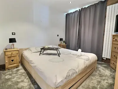 Un ou plusieurs lits dans un hébergement de l'établissement Appartement 6 personnes avec Parking Couvert - 1 chambre - 4 lits - Netflix & wifi haut débit