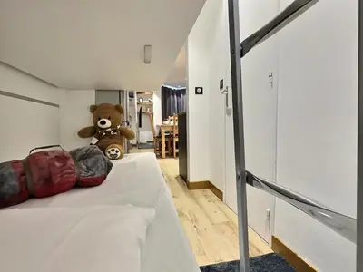Un ou plusieurs lits dans un hébergement de l'établissement Appartement 6 personnes avec Parking Couvert - 1 chambre - 4 lits - Netflix & wifi haut débit