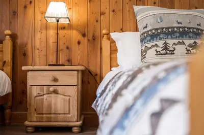Un ou plusieurs lits dans un hébergement de l'établissement Madame Vacances Chalet La Grande Sassière