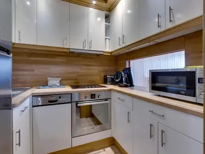 Cuisine ou kitchenette dans l'établissement T2 cosy à Tignes Val Claret - Proche pistes, 4 pers, Wifi inclus - FR-1-641-85