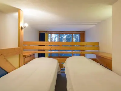 Un ou plusieurs lits dans un hébergement de l'établissement Duplex au calme avec mezzanine et terrasse pour 6/7 personnes - FR-1-346-522
