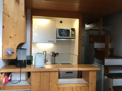 Cuisine ou kitchenette dans l'établissement Duplex au calme avec mezzanine et terrasse pour 6/7 personnes - FR-1-346-522