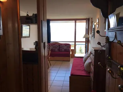 Un ou plusieurs lits dans un hébergement de l'établissement Appartement lumineux au centre avec balcon et 5 couchages - FR-1-346-523