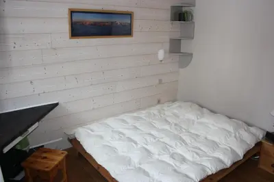 Un ou plusieurs lits dans un hébergement de l'établissement Appartement T3 pour 6 personnes