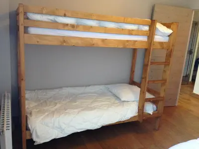 Un ou plusieurs lits dans un hébergement de l'établissement Appartement T3 pour 6 personnes