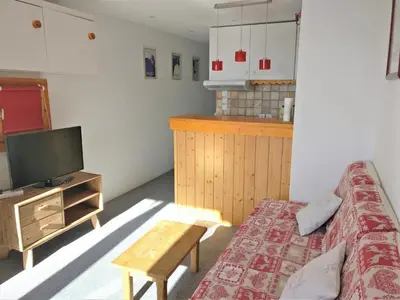 Un ou plusieurs lits dans un hébergement de l'établissement Charmant appart 2 pièces, ski aux pieds, balcon - FR-1-346-461