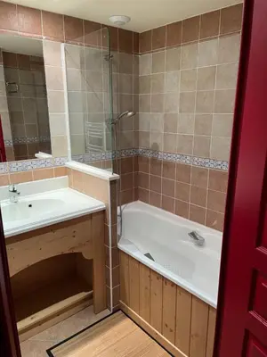 Salle de bains dans l'établissement Les alpages location appartement 108