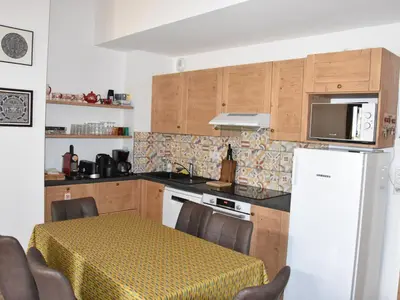 Cuisine ou kitchenette dans l'établissement Duplex 4 pièces, 2 étoiles, proche du centre, max 6 pers. - FR-1-464-210