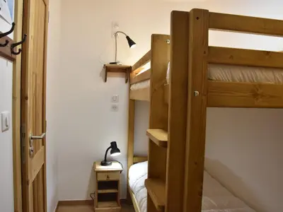 Un ou plusieurs lits dans un hébergement de l'établissement Duplex 4 pièces, 2 étoiles, proche du centre, max 6 pers. - FR-1-464-210