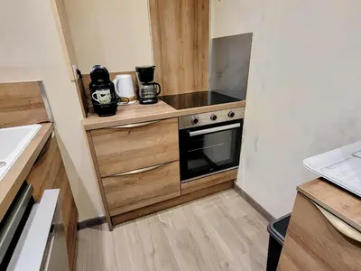 Cuisine ou kitchenette dans l'établissement Appartement rénové, ski aux pieds, balcons, 3 pièces pour 8 pers. - FR-1-346-519