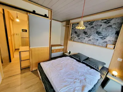 Un ou plusieurs lits dans un hébergement de l'établissement Appartement rénové, ski aux pieds, balcons, 3 pièces pour 8 pers. - FR-1-346-519