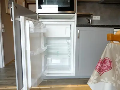 Cuisine ou kitchenette dans l'établissement Studio moderne confortable à Tignes, proche pistes, animaux acceptés - FR-1-502-460