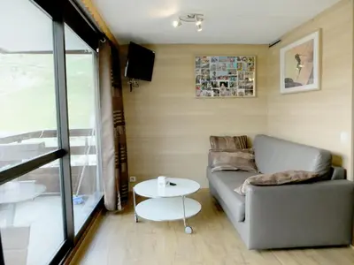 Coin salon dans l'établissement Studio moderne confortable à Tignes, proche pistes, animaux acceptés - FR-1-502-460