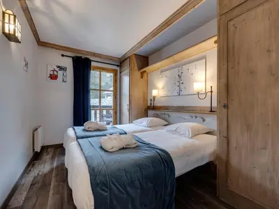 Un ou plusieurs lits dans un hébergement de l'établissement Appartement rénové aux Arcs 1950 avec accès ski direct - FR-1-686-5