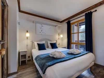 Un ou plusieurs lits dans un hébergement de l'établissement Appartement rénové aux Arcs 1950 avec accès ski direct - FR-1-686-5