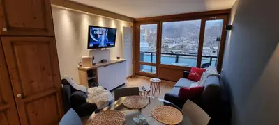 Télévision ou salle de divertissement dans l'établissement Le 1888 Val d'Isère