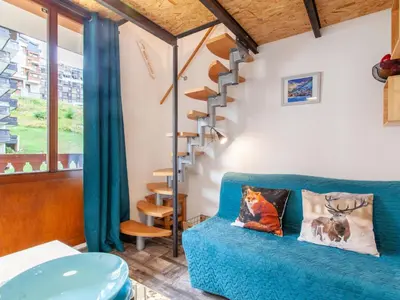 Coin salon dans l'établissement Studio Rond Point des Pistes - Val Claret-19 by Interhome